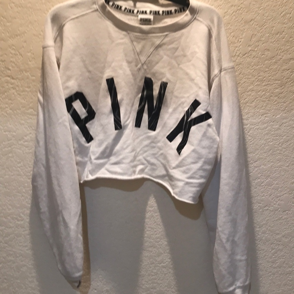 A long sleeve cropped “pink” shirt
